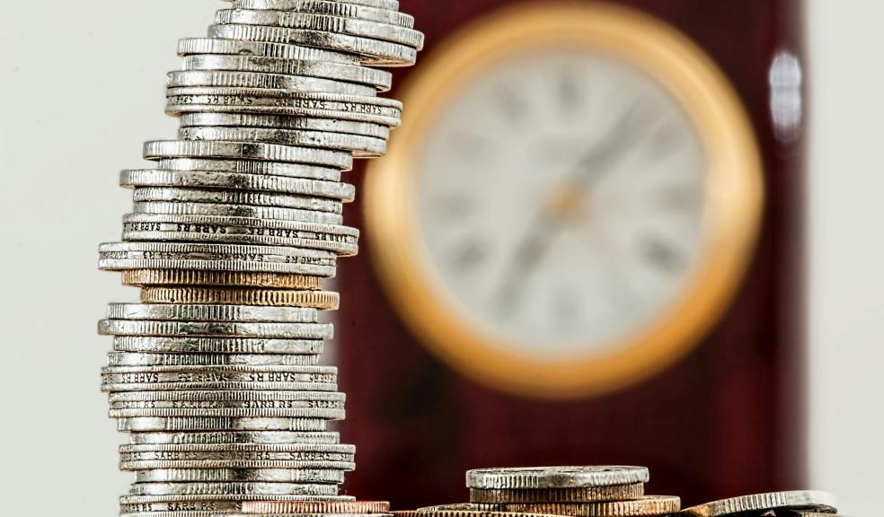 Selective Focus Photo of Stacked Coins