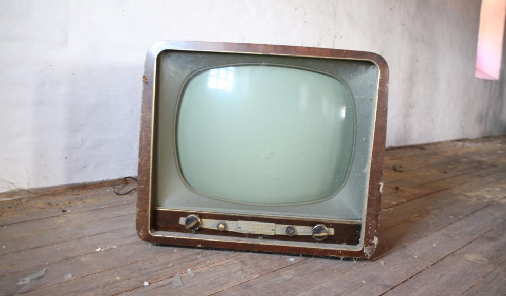 Vintage Brown Crt Tv on Parquet Wood Flooring