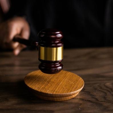 Brown Wooden Gavel on Brown Wooden Table