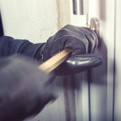 Person Opening a Door with a Bar